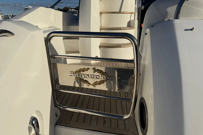 Slide: The Image of 2008 Sunseeker Manhattan 50 yacht entrance with branded gate and steps. - 18