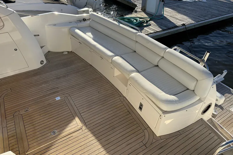 Slide: The Image of Luxurious Sunseeker Manhattan 50 yacht deck with white seating, 2008 model. - 19