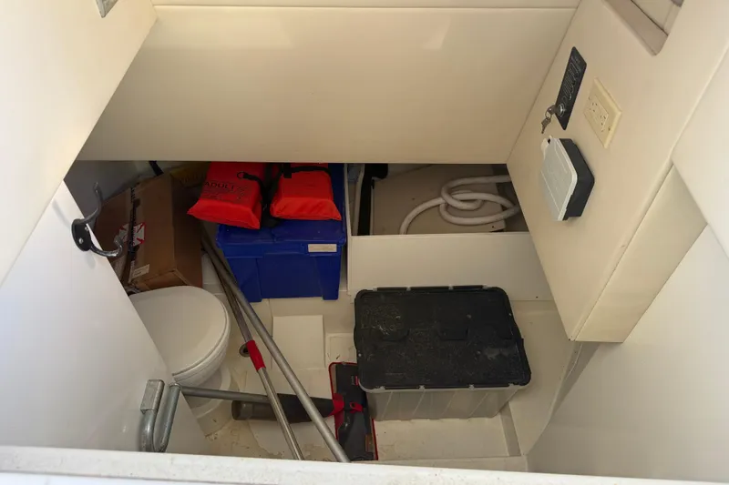 Slide: The Image of Storage area in a 2008 Sunseeker Manhattan 50 yacht with life jackets and equipment. - 25