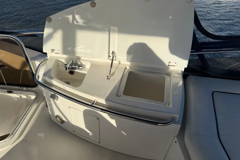 Slide: The Image of 2008 Sunseeker Manhattan 50 yacht sink and storage area on deck. - 29