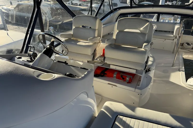 Slide: The Image of Interior view of 2008 Sunseeker Manhattan 50 yacht with helm and seating area. - 35