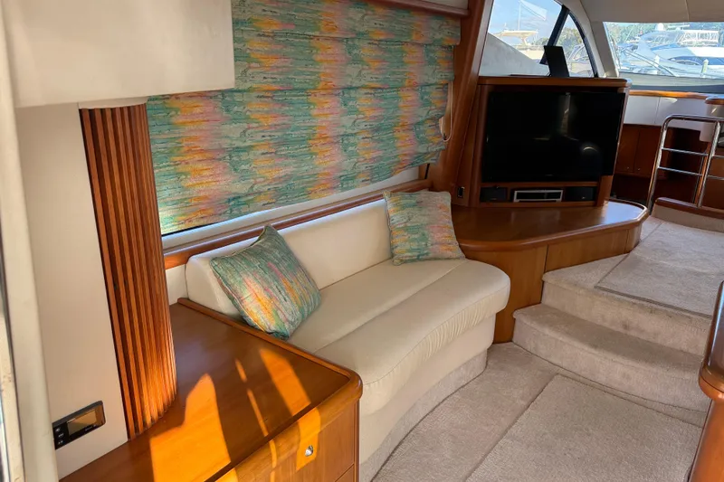Slide: The Image of Luxurious 2008 Sunseeker Manhattan 50 yacht interior with cozy seating and entertainment area. - 41
