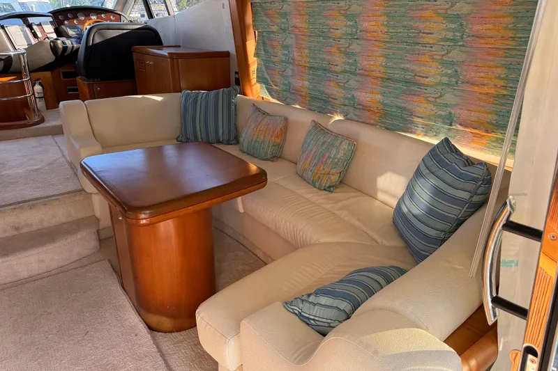 Slide: The Image of Luxurious interior of 2008 Sunseeker Manhattan 50 yacht with plush seating and wooden table. - 42