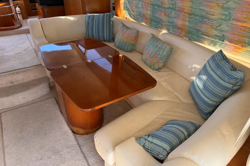 Slide: The Image of Luxurious interior of 2008 Sunseeker Manhattan 50 yacht with elegant seating and wooden table. - 43