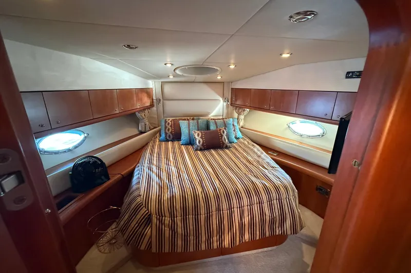 Slide: The Image of Luxurious cabin interior of 2008 Sunseeker Manhattan 50 yacht with elegant bedding. - 58