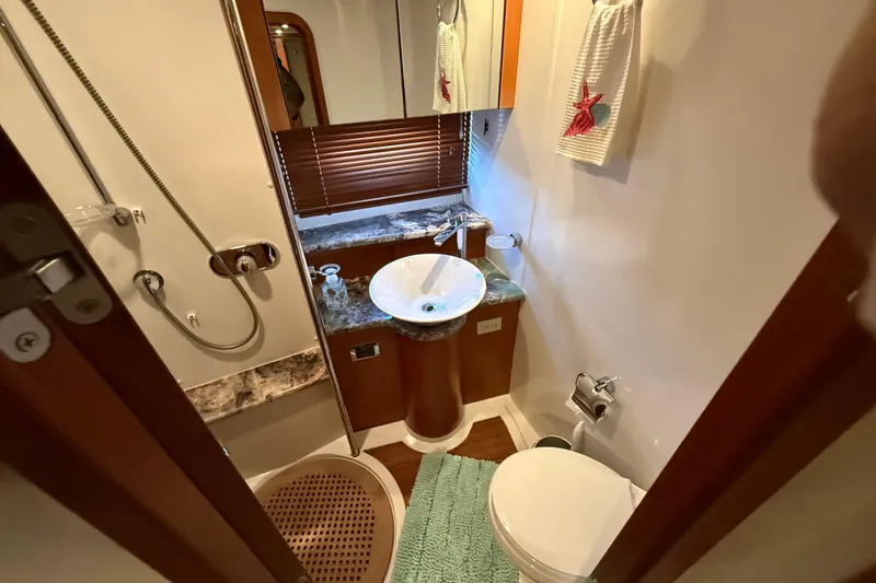 Slide: The Image of Luxurious bathroom in 2008 Sunseeker Manhattan 50 yacht with modern fixtures and elegant design. - 71