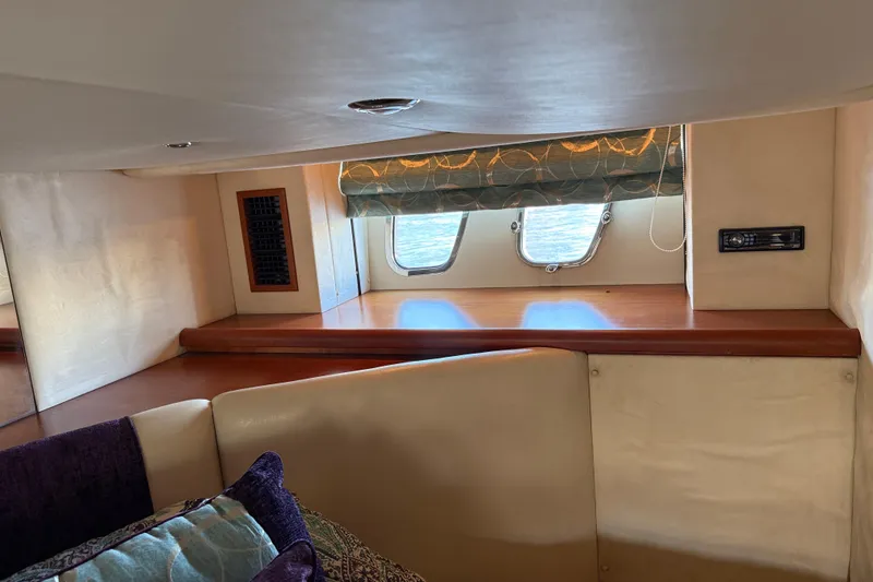 Slide: The Image of Interior of 2008 Sunseeker Manhattan 50 yacht, featuring cozy seating and ocean view windows. - 75