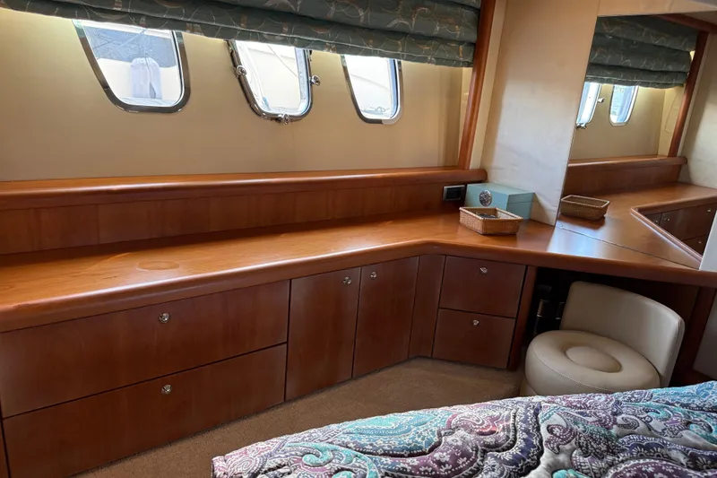 Slide: The Image of Luxurious interior of 2008 Sunseeker Manhattan 50 yacht with wooden cabinetry and windows. - 76