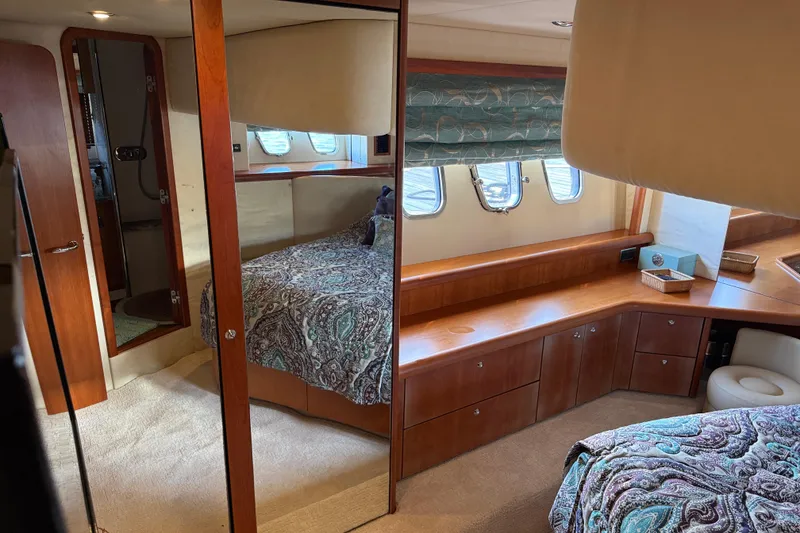 Slide: The Image of Luxurious cabin interior of 2008 Sunseeker Manhattan 50 yacht with elegant wood finishes. - 77