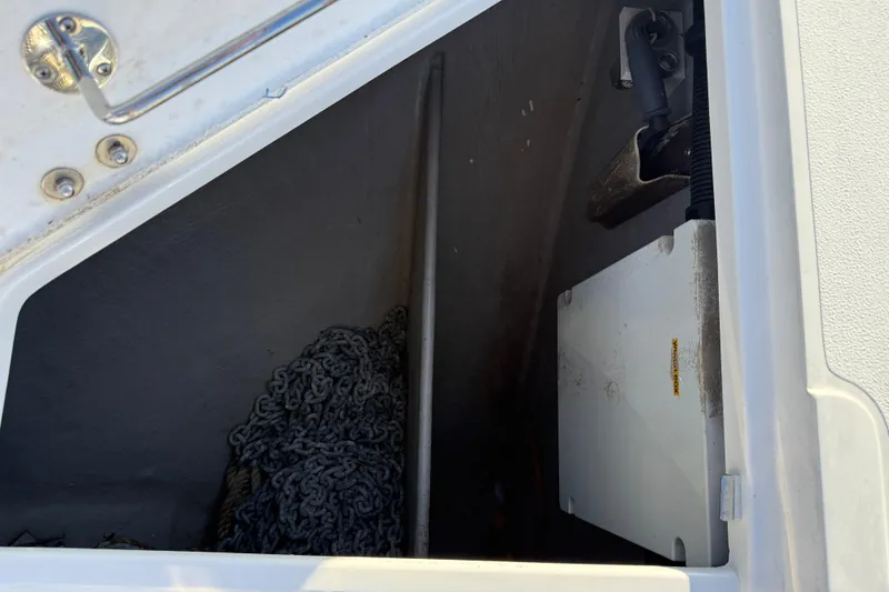 Slide: The Image of Storage compartment of a 2008 Sunseeker Manhattan 50 yacht with chain and equipment. - 8