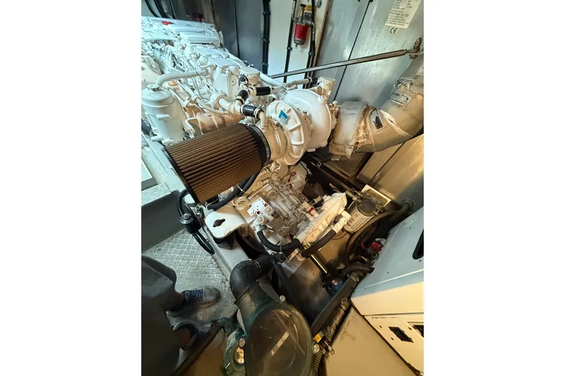 Slide: The Image of Engine room of 2008 Sunseeker Manhattan 50 yacht, showcasing detailed machinery components. - 86