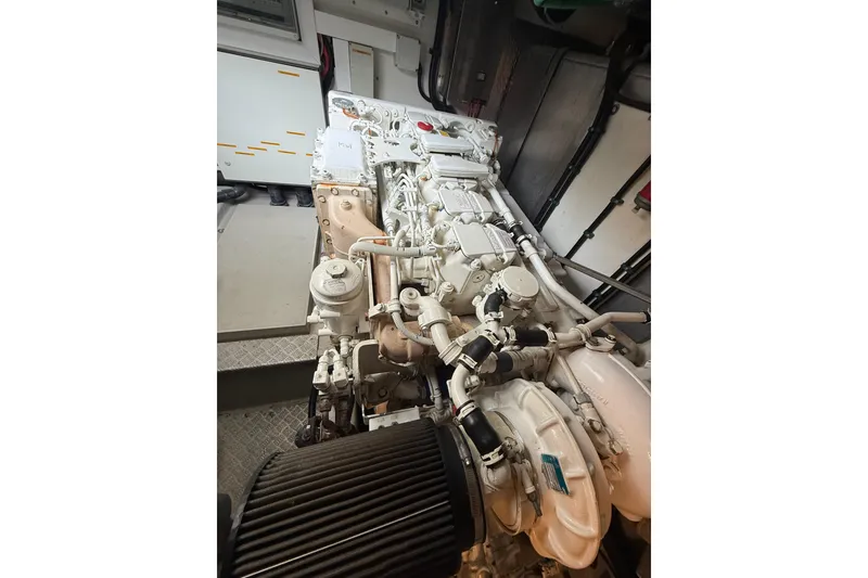 Slide: The Image of Engine room of a 2008 Sunseeker Manhattan 50 yacht, showcasing detailed machinery. - 87