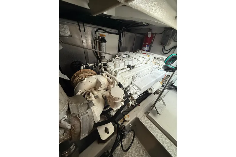 Slide: The Image of Engine room of a 2008 Sunseeker Manhattan 50 yacht, showcasing its powerful machinery. - 89