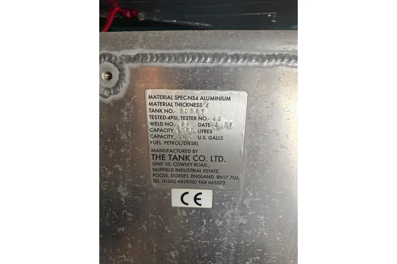 Slide: The Image of Sunseeker Manhattan 50 2008 fuel tank label, aluminum material, capacity details, manufactured by The Tank Co. Ltd. - 92