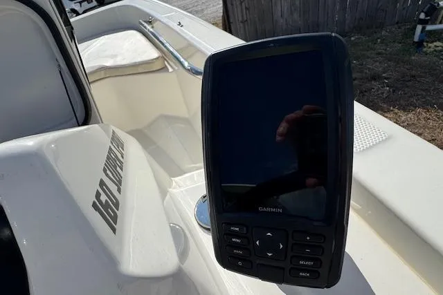 Slide: The Image of 2022 Boston Whaler 160 Super Sport with Garmin navigation system. - 23
