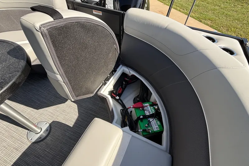 Slide: The Image of Interior of 2026 Viaggio X24U boat showing storage compartment with battery. - 10