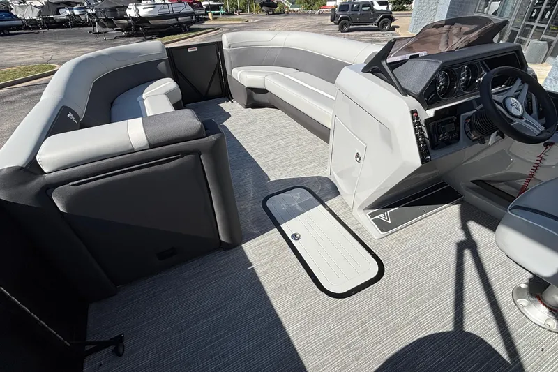 Slide: The Image of Interior of 2026 Viaggio X24U boat with modern seating and steering console. - 13
