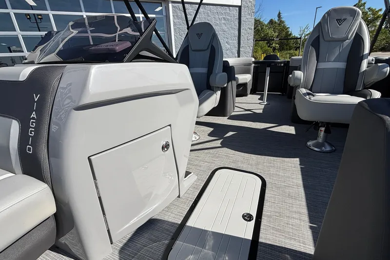 Slide: The Image of Interior of 2026 Viaggio X24U boat with modern seating and sleek design. - 18