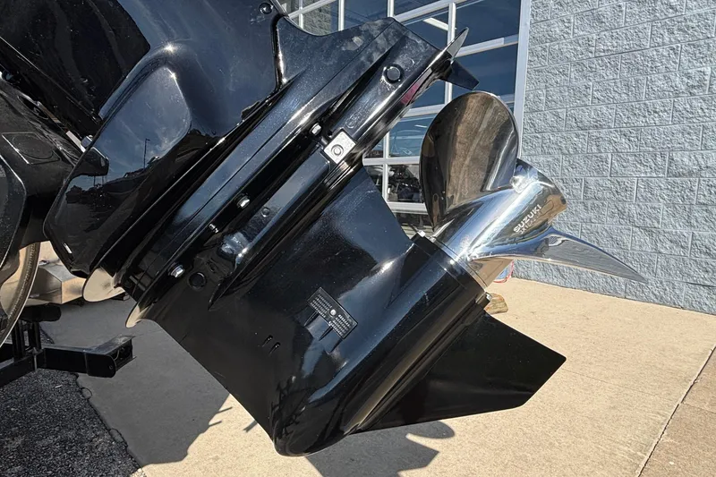Slide: The Image of Close-up of a 2026 Viaggio X24U boat motor with a shiny propeller. - 2