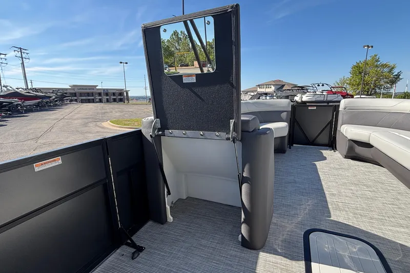 Slide: The Image of 2026 Viaggio X24U pontoon boat interior with seating and open deck view. - 23