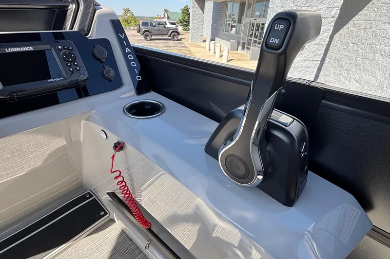 Slide: The Image of Control panel of 2026 Viaggio X24U boat with throttle and navigation system. - 33