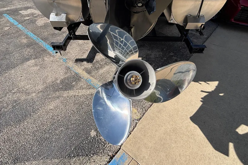 Slide: The Image of Shiny propeller of a 2026 Viaggio X24U boat on pavement. - 4