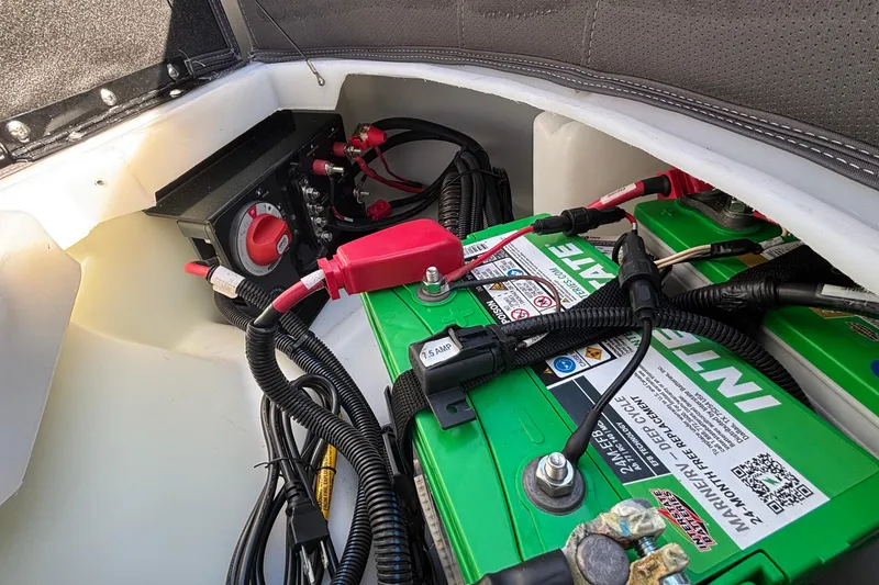 Slide: The Image of Battery compartment of 2026 Viaggio X24U with green Interstate batteries and wiring connections. - 9