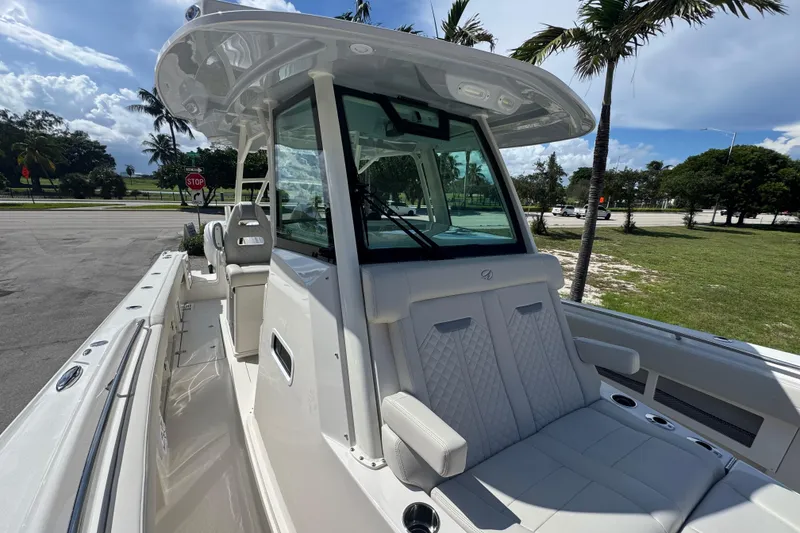 Slide: The Image of 2026 Sailfish 360 CC boat with sleek design, spacious seating, and modern features. - 22