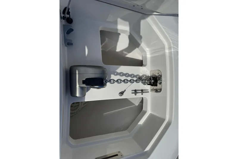 Slide: The Image of Anchor chain and winch on 2026 Sailfish 360 CC boat deck. - 27