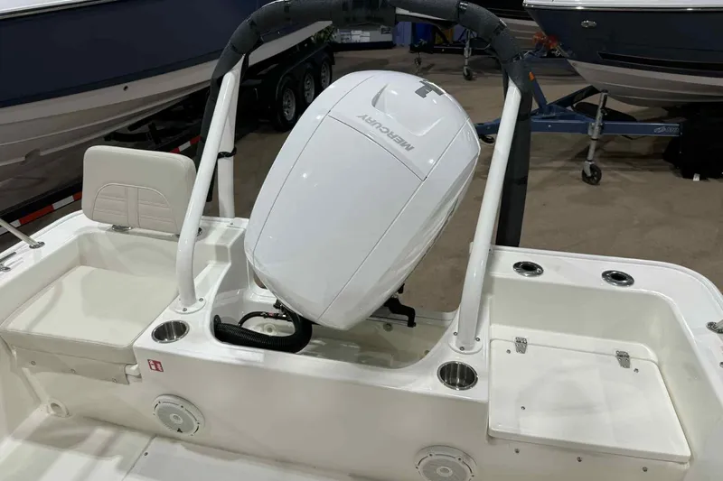 Slide: The Image of 2026 Boston Whaler 190 Montauk boat with Mercury engine, interior view. - 14