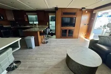 Slide: The Image of Luxurious interior of 2013 Bravada Bella Luna with modern kitchen and living area. - 4