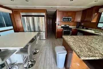 Slide: The Image of Modern kitchen in 2013 Bravada Bella Luna with granite countertops and stainless steel appliances. - 6