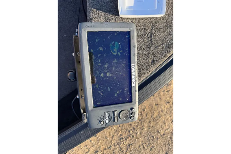 Slide: The Image of Fishfinder on 2017 Alumacraft Competitor 205 Sport boat deck, displaying sonar screen. - 19