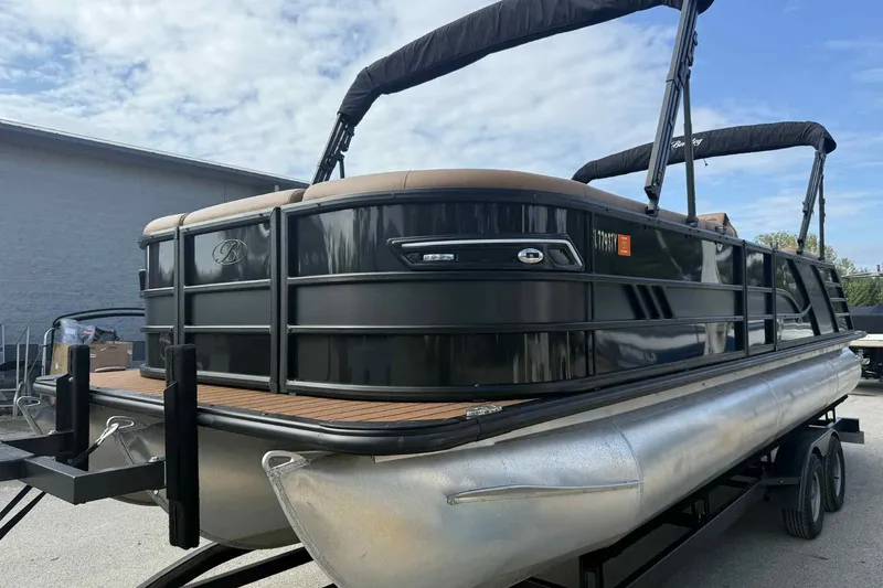 The Image of 2025 Bentley Pontoons Elite 253 Admiral on trailer, showcasing sleek design and modern features. - 0