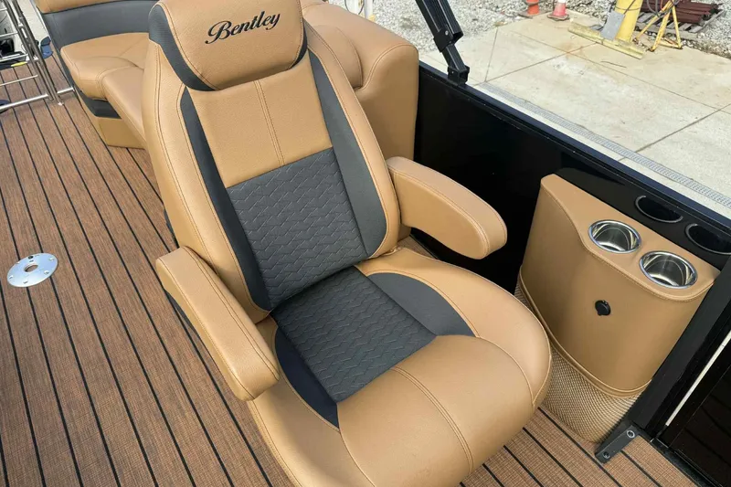Slide: The Image of Luxurious seating on 2025 Bentley Pontoons Elite 253 Admiral with cup holders and premium upholstery. - 15
