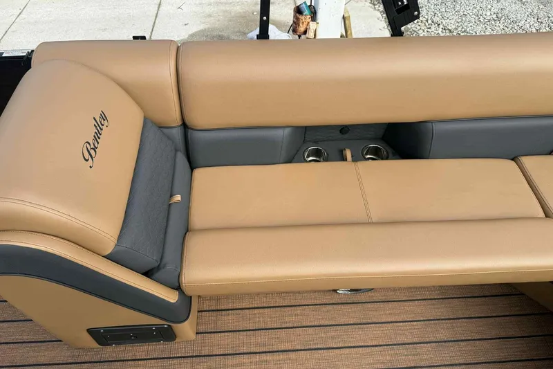 Slide: The Image of Luxurious tan and gray seating on 2025 Bentley Pontoons Elite 253 Admiral. - 9