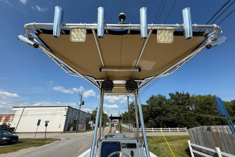 Slide: The Image of 2012 Pathfinder 2400 Tournament Edition boat with T-top and rod holders. - 11