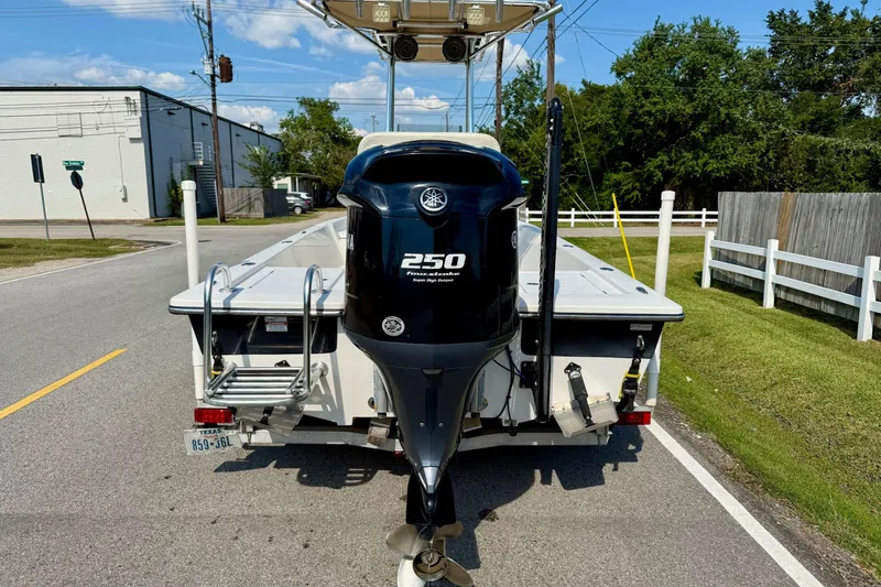 Slide: The Image of 2012 Pathfinder 2400 Tournament Edition boat with Yamaha 250 engine on a street. - 3