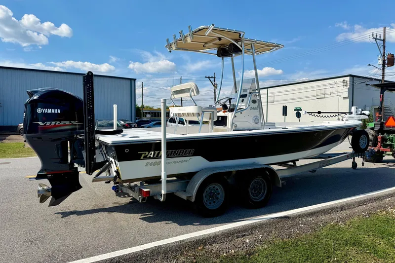 Slide: The Image of 2012 Pathfinder 2400 Tournament Edition boat on trailer with Yamaha outboard motor. - 4