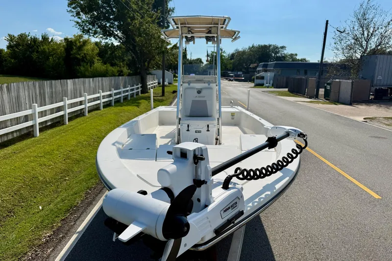 Slide: The Image of 2012 Pathfinder 2400 Tournament Edition boat on a road, featuring a Minn Kota trolling motor. - 6