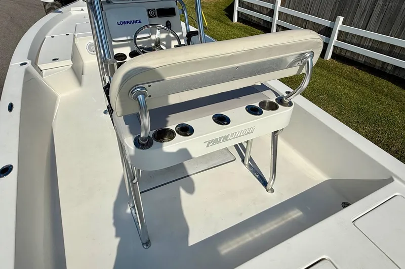 Slide: The Image of 2012 Pathfinder 2400 Tournament Edition boat interior with steering console and seating. - 8