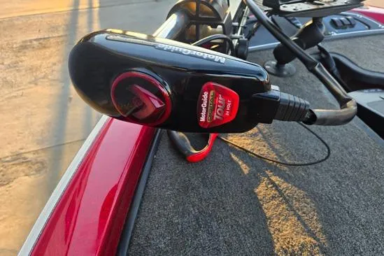 Slide: The Image of 2011 Ranger Z120 Comanche boat dashboard with Lowrance fishfinder and control panel. - 8