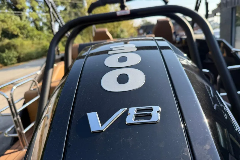 Slide: The Image of Close-up of 2025 Bentley Pontoons Elite 253 Swingback V8 engine detail. - 6