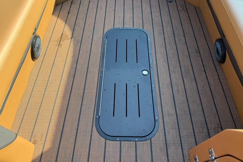 Slide: The Image of 2025 Bentley Pontoons Elite 253 Swingback deck with sleek, modern design and premium materials. - 9