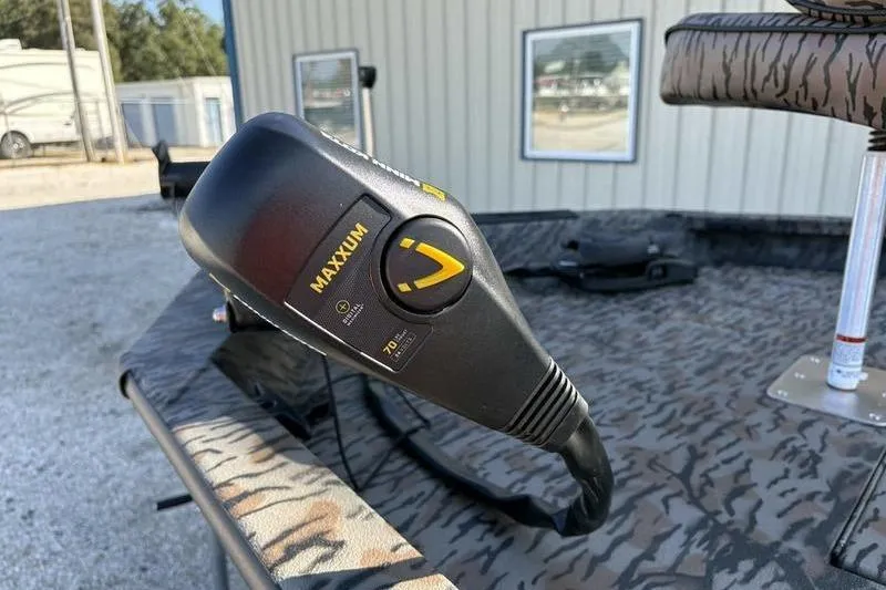Slide: The Image of Close-up of a Maxxum control on a 2026 Xpress H20B Bay boat. - 13