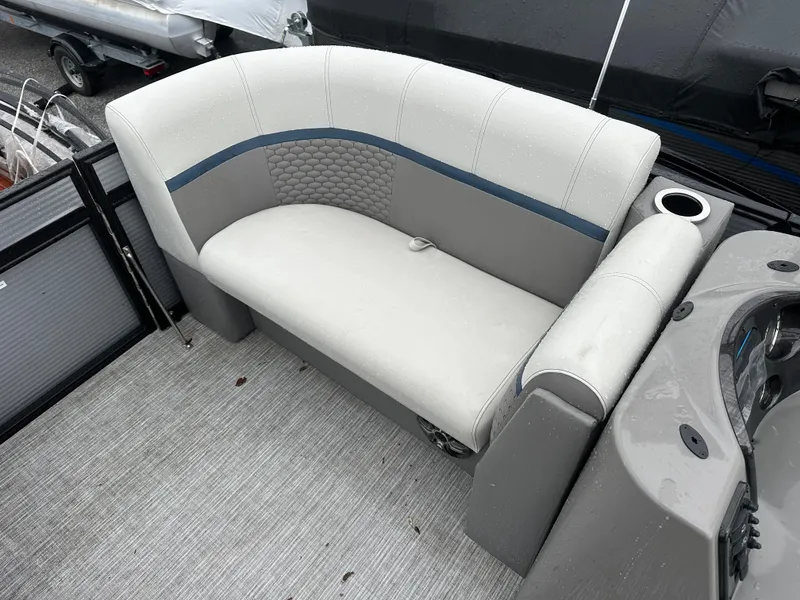 Slide: The Image of 2023 Qwest 816 Lanai LT boat seat with gray upholstery and cup holder. - 5
