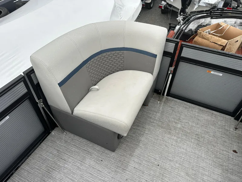 Slide: The Image of 2023 Qwest 816 Lanai LT boat seat with gray upholstery and blue accent. - 6