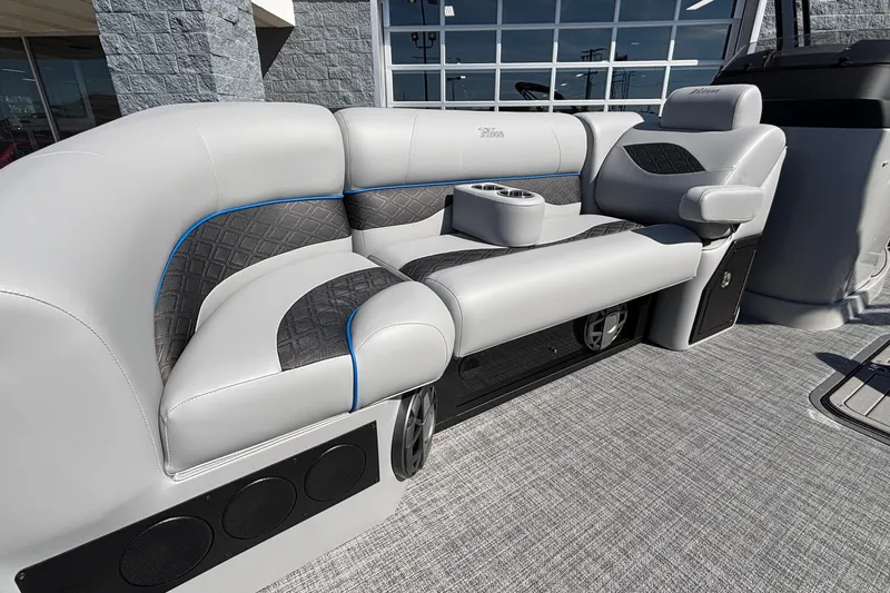 Slide: The Image of Luxurious seating on 2026 JC Neptoon 25TT Sport pontoon boat with cup holders and stylish design. - 13