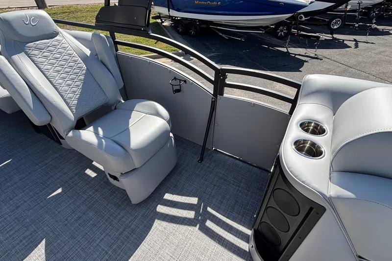 Slide: The Image of 2026 JC Neptoon 25TT Sport boat interior with luxury seating and cup holders. - 15