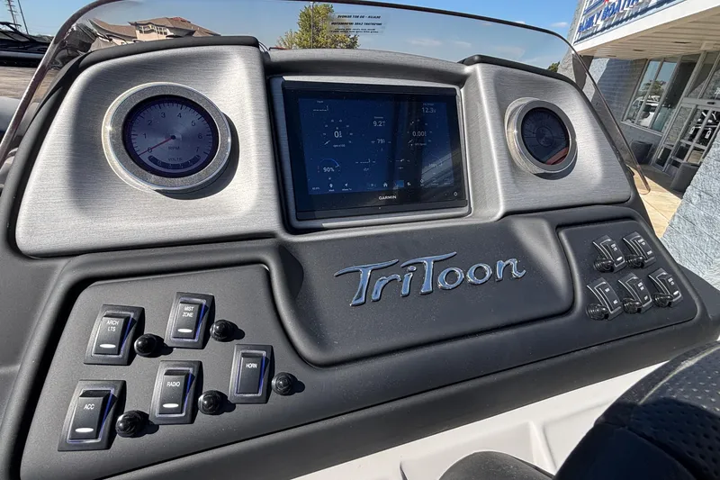 Slide: The Image of Dashboard of 2026 JC Neptoon 25TT Sport boat with gauges and controls. - 19